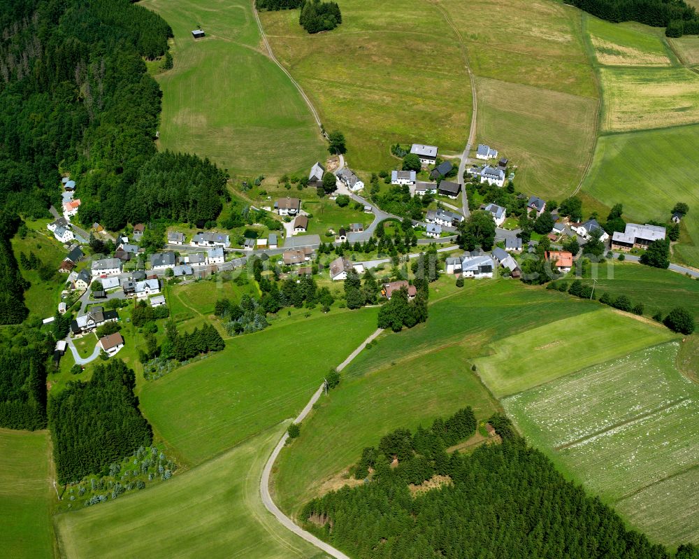 Räumlas from the bird's eye view: Village - view on the edge of forested areas in Räumlas in the state Bavaria, Germany