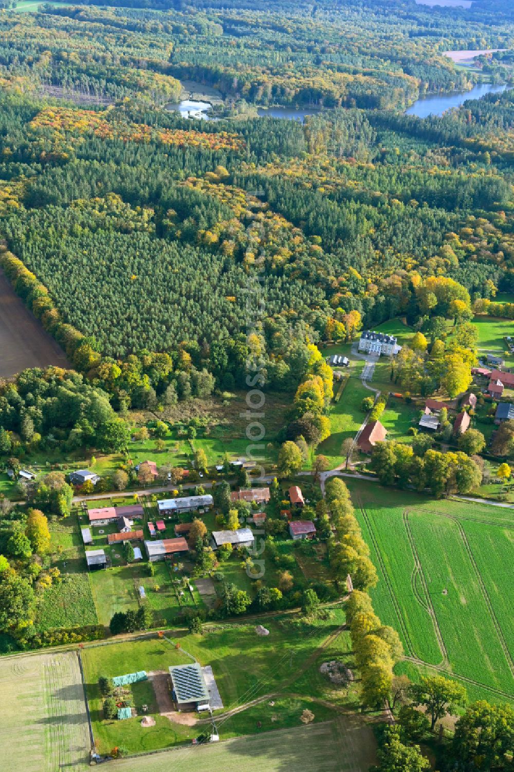 Aerial image Tüschow - Village - view on the edge of forested areas in Tueschow in the state Mecklenburg - Western Pomerania, Germany