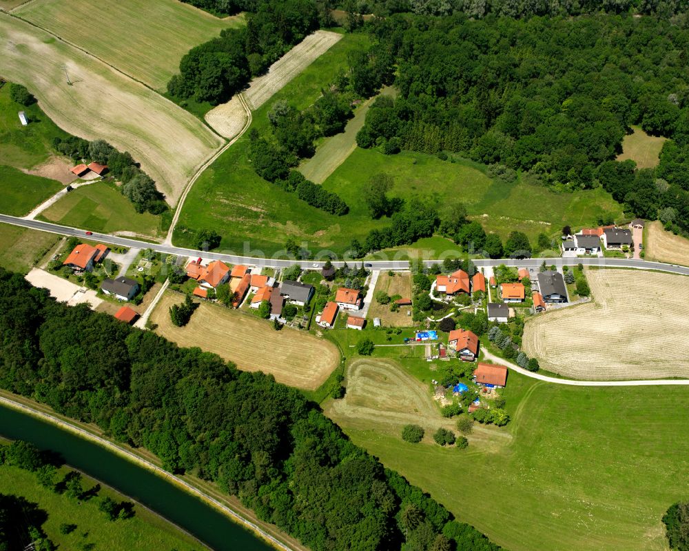 Aerial image Unterberg - Village - view on the edge of forested areas in Unterberg in the state Bavaria, Germany