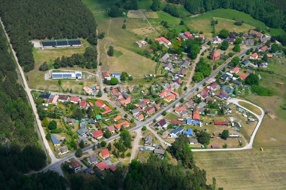 Zechow from the bird's eye view: Village - view on the edge of forested areas in Zechow in the state Brandenburg, Germany