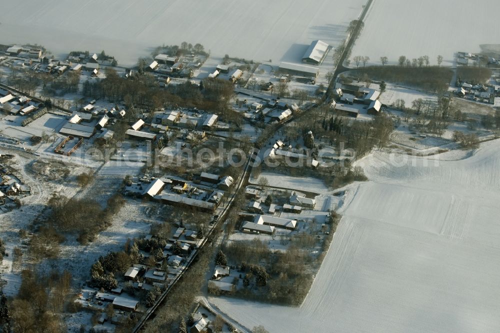 Altlandsberg from above - Snowy village view of Wegendorf near the land road L 235 in winter in the state Brandenburg