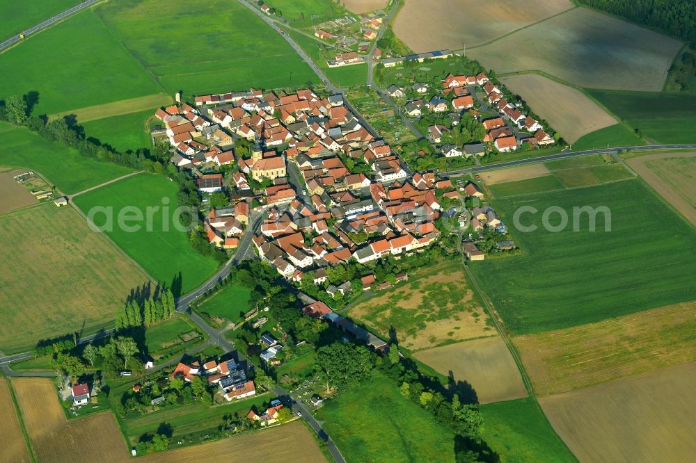 Ostheim from the bird's eye view: Village - View of the district Hassberge belonging municipality in Ostheim in the state Bavaria