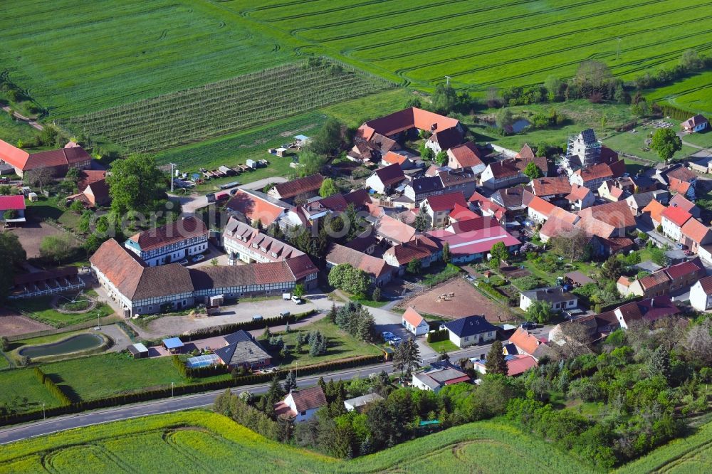 Aerial photograph Drebsdorf - Agricultural land and field borders surround the settlement area of the village in Drebsdorf in the state Saxony-Anhalt, Germany