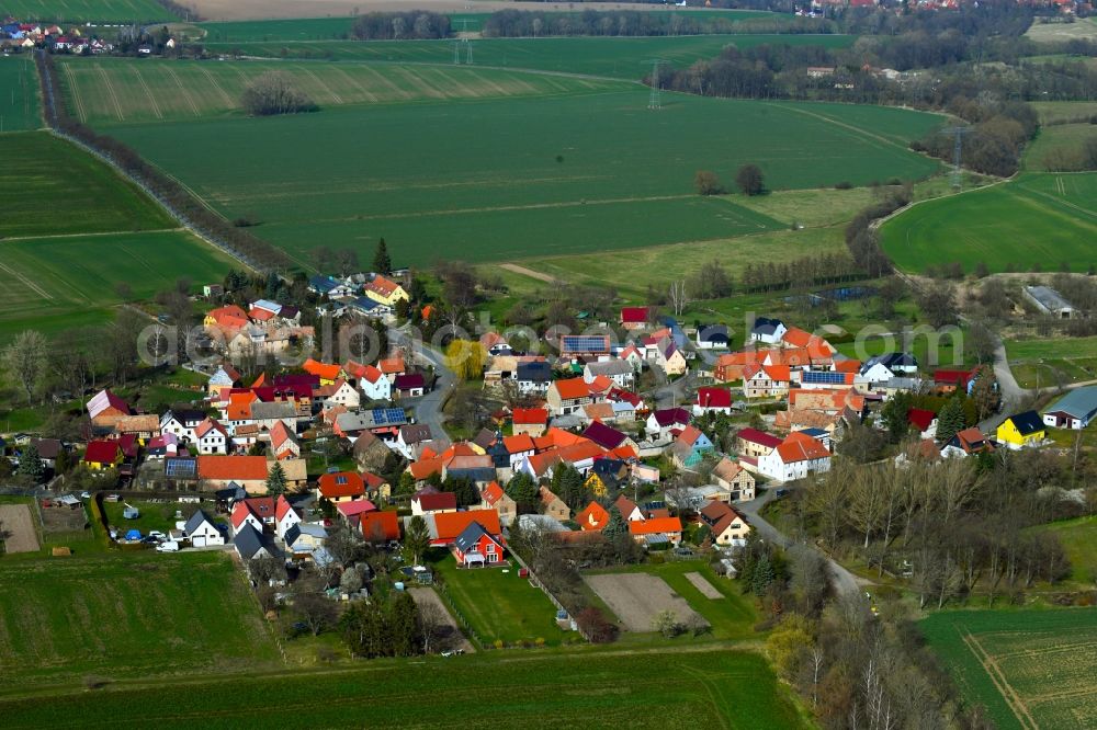 Aerial photograph Hammerstedt - Agricultural land and field boundaries border the settlement area of a??a??the village Hammerstedt in the state Thuringia, Germany