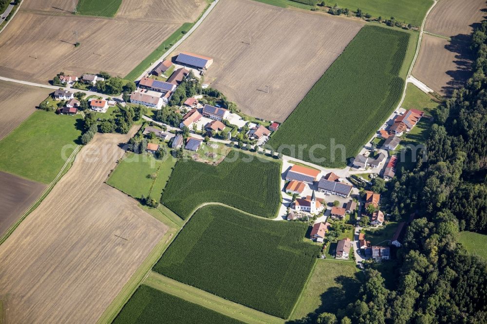 Thal from above - Agricultural land, fields and forest border the two-part settlement area of a??a??the village Thal in the state Bavaria, Germany