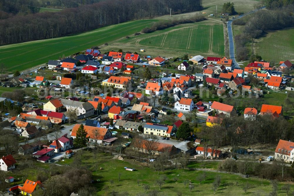 Mechelroda from the bird's eye view: Agricultural land, fields, meadows and forest surround the settlement area of a??a??the village of Mechelroda in the state of Thuringia, Germany
