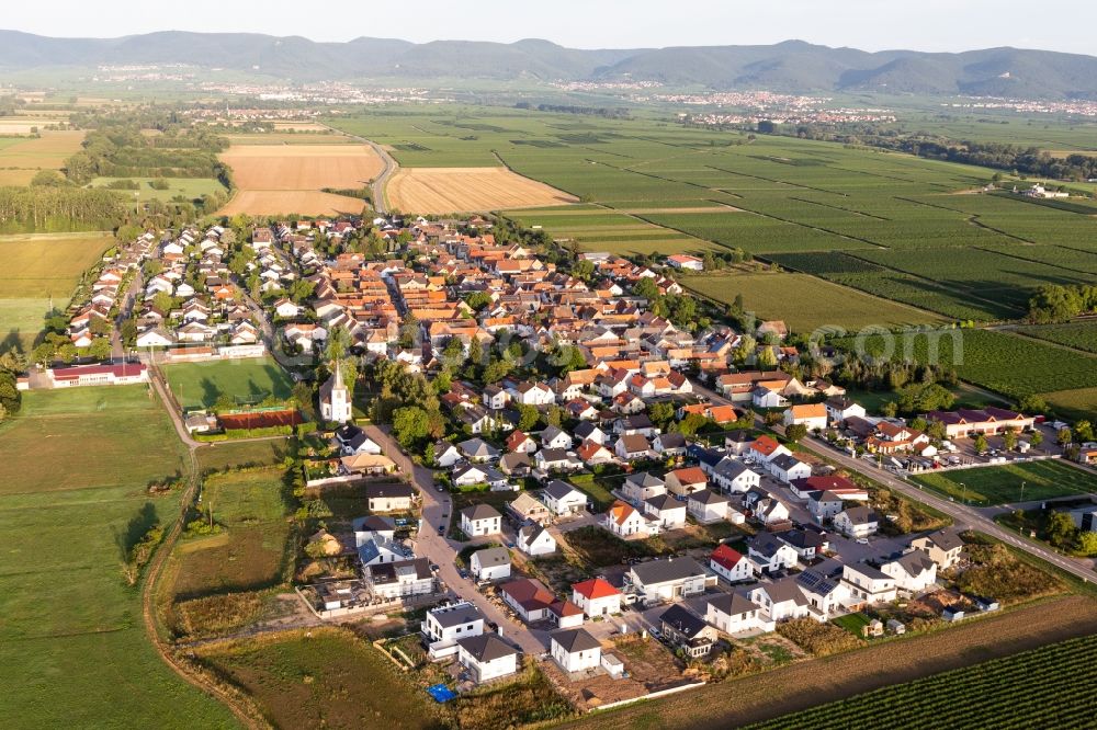 Altdorf from above - Agricultural land and field borders surround the settlement area of the village in Altdorf in the state Rhineland-Palatinate, Germany