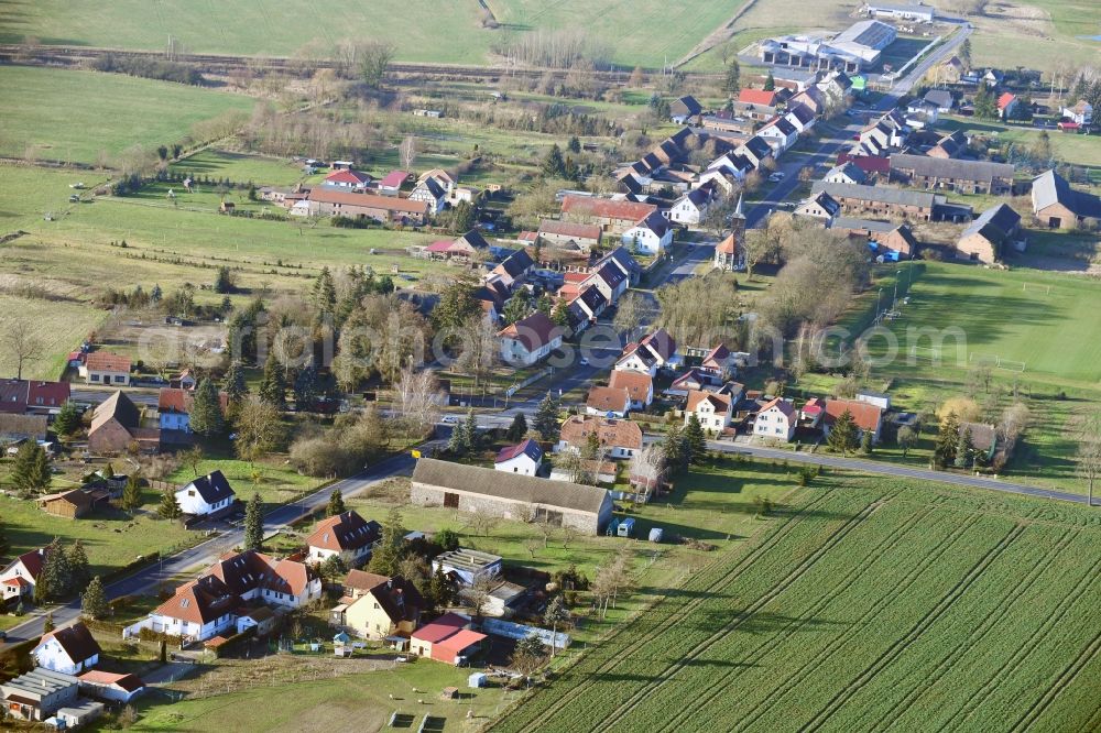 Aerial photograph Altlüdersdorf - Agricultural land and field borders surround the settlement area of the village in Altluedersdorf in the state Brandenburg, Germany