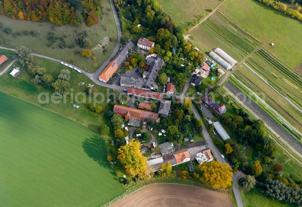 Aerial image Berlepsch - Agricultural land and field borders surround the settlement area of the village in Berlepsch in the state Hesse, Germany