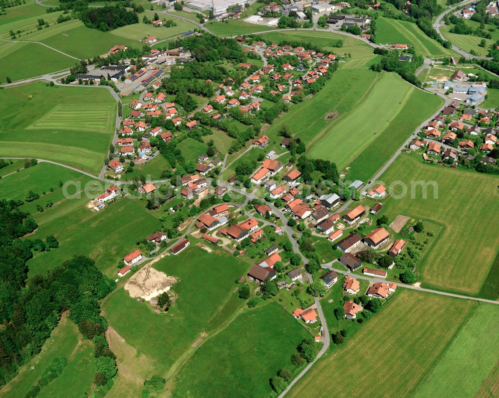 Ahornöd from the bird's eye view: Agricultural land and field boundaries surround the settlement area of the village in Ahornöd in the state Bavaria, Germany