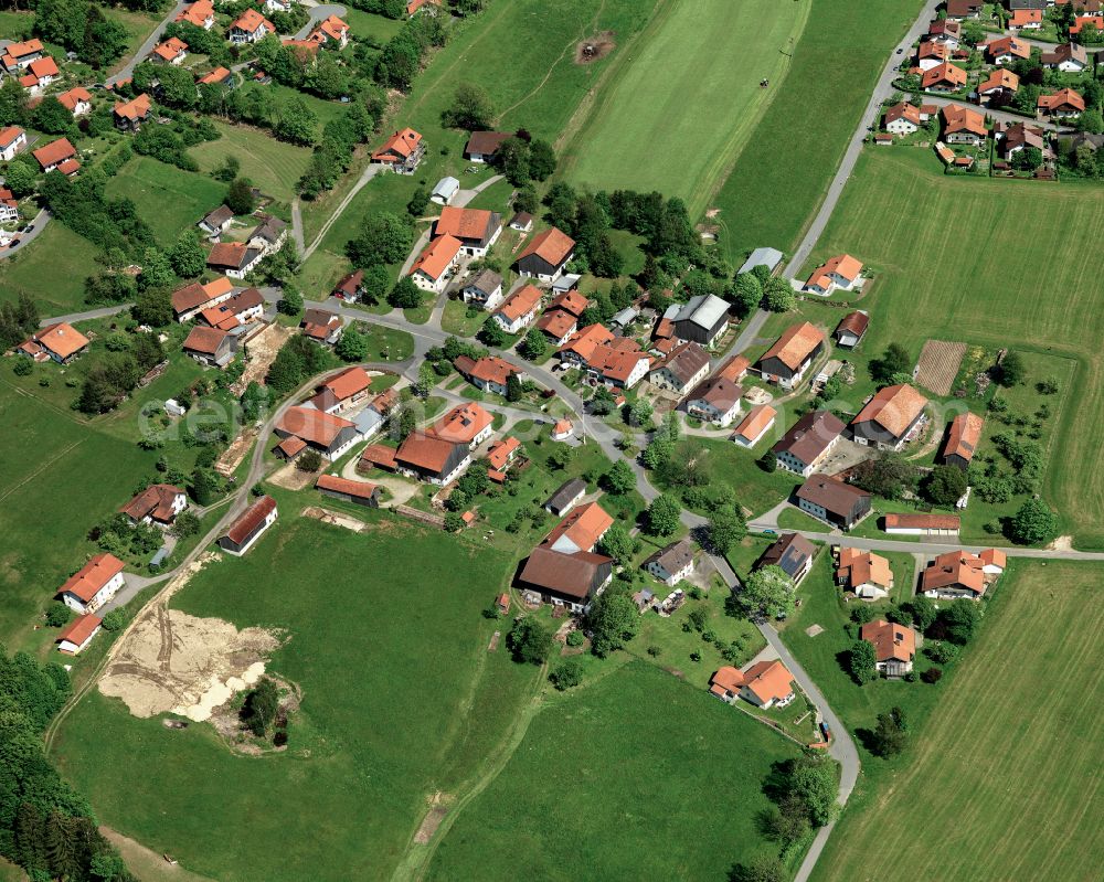Aerial image Ahornöd - Agricultural land and field boundaries surround the settlement area of the village in Ahornöd in the state Bavaria, Germany