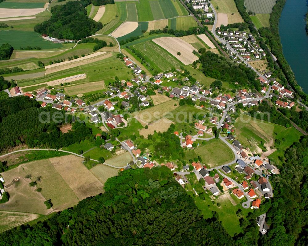 Albert from above - Agricultural land and field boundaries surround the settlement area of the village in Albert in the state Baden-Wuerttemberg, Germany