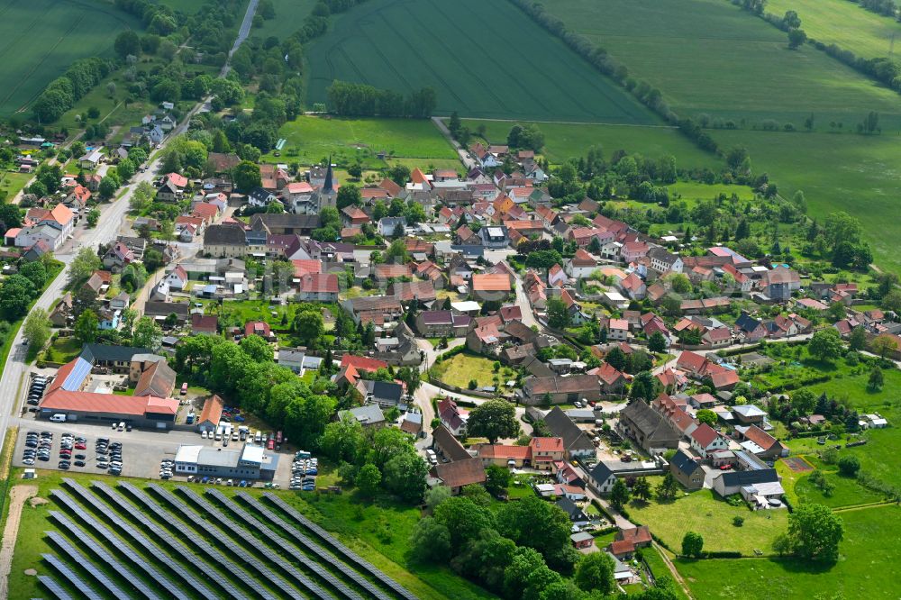 Aerial image Allstedt - Agricultural land and field boundaries surround the settlement area of the village in Allstedt in the state Saxony-Anhalt, Germany