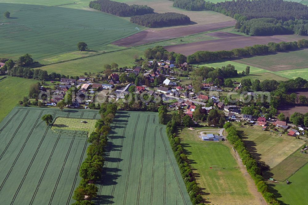 Alt Zachun from above - Agricultural land and field boundaries surround the settlement area of the village in Alt Zachun in the state Mecklenburg - Western Pomerania, Germany