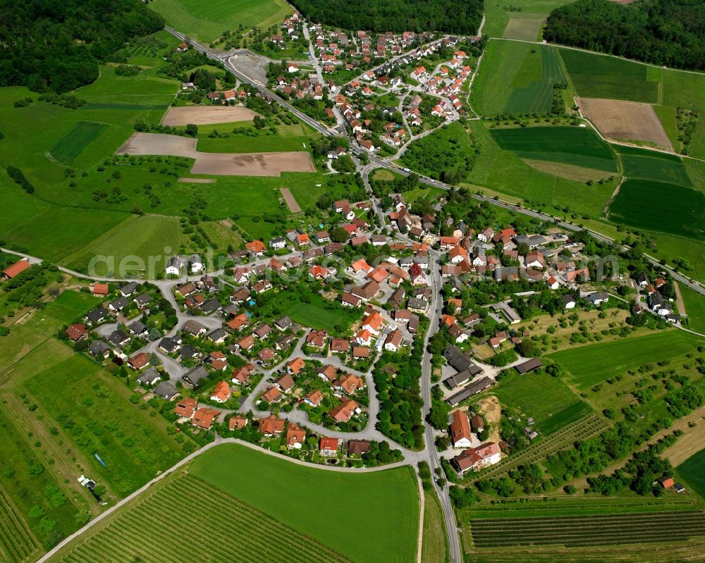 Aerial photograph Backnang - Agricultural land and field boundaries surround the settlement area of the village in Backnang in the state Baden-Wuerttemberg, Germany