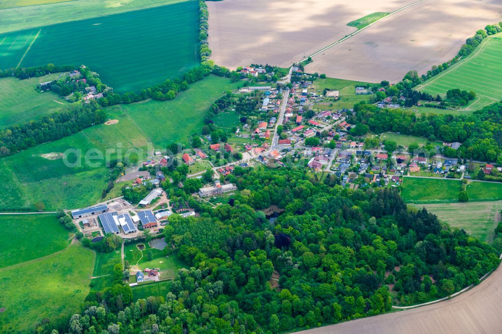 Aerial photograph Banzin - Agricultural land and field boundaries surround the settlement area of the village in Banzin in the state Mecklenburg - Western Pomerania, Germany