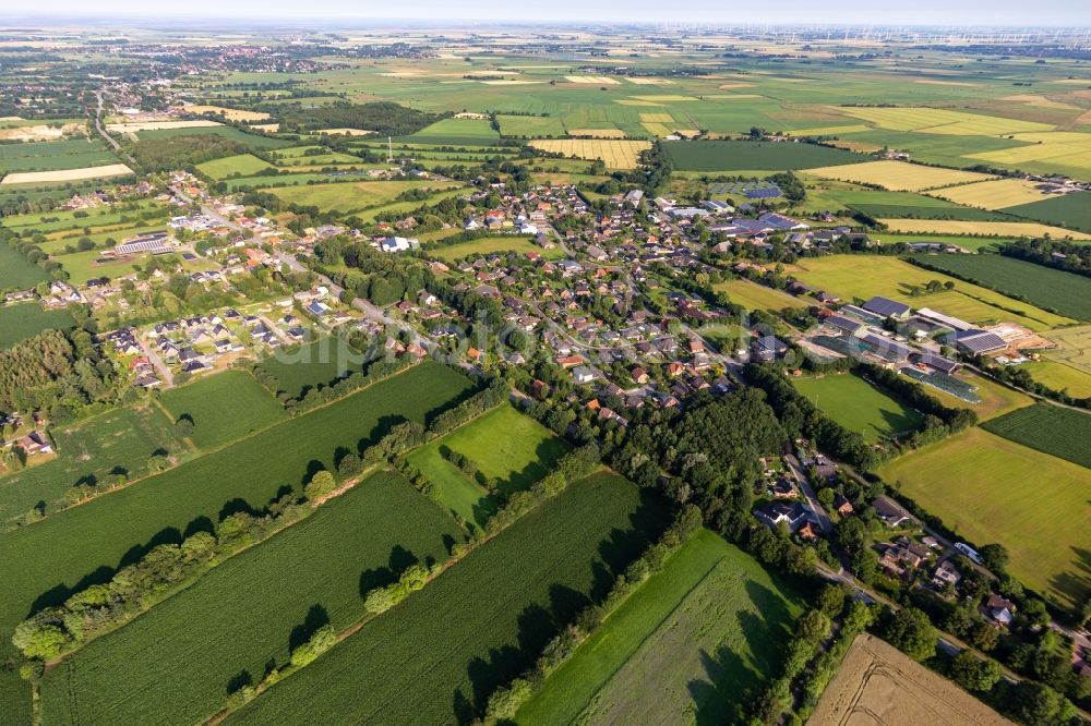 Aerial image Bargenstedt - Agricultural land and field boundaries surround the settlement area of the village in Bargenstedt in the state Schleswig-Holstein, Germany