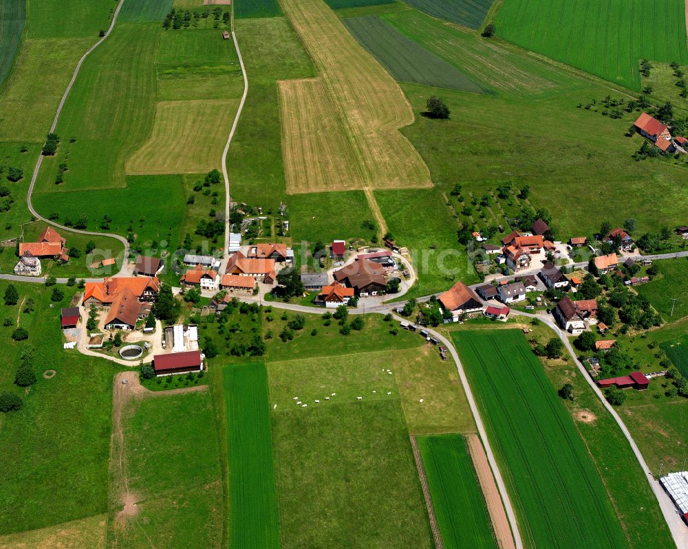 Aerial image Überberg - Agricultural land and field boundaries surround the settlement area of the village in Überberg in the state Baden-Wuerttemberg, Germany