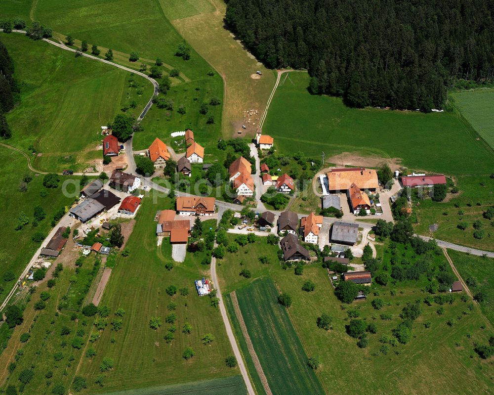 Überberg from above - Agricultural land and field boundaries surround the settlement area of the village in Überberg in the state Baden-Wuerttemberg, Germany