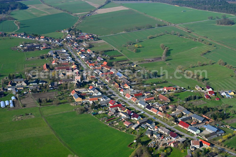 Aerial image Bergsdorf - Agricultural land and field boundaries surround the settlement area of the village in Bergsdorf in the state Brandenburg, Germany