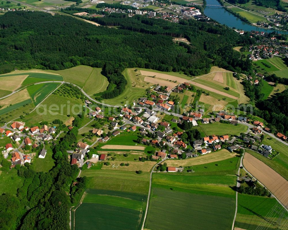 Binzgen from the bird's eye view: Agricultural land and field boundaries surround the settlement area of the village in Binzgen in the state Baden-Wuerttemberg, Germany