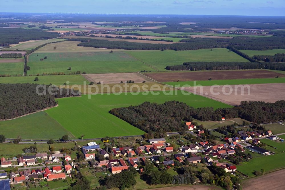Borken from the bird's eye view: Agricultural land and field boundaries surround the settlement area of the village in Borken in the state Brandenburg, Germany