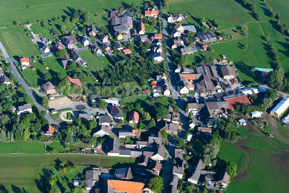 Aerial photograph Braak - Agricultural land and field boundaries surround the settlement area of the village in Braak in the state Lower Saxony, Germany