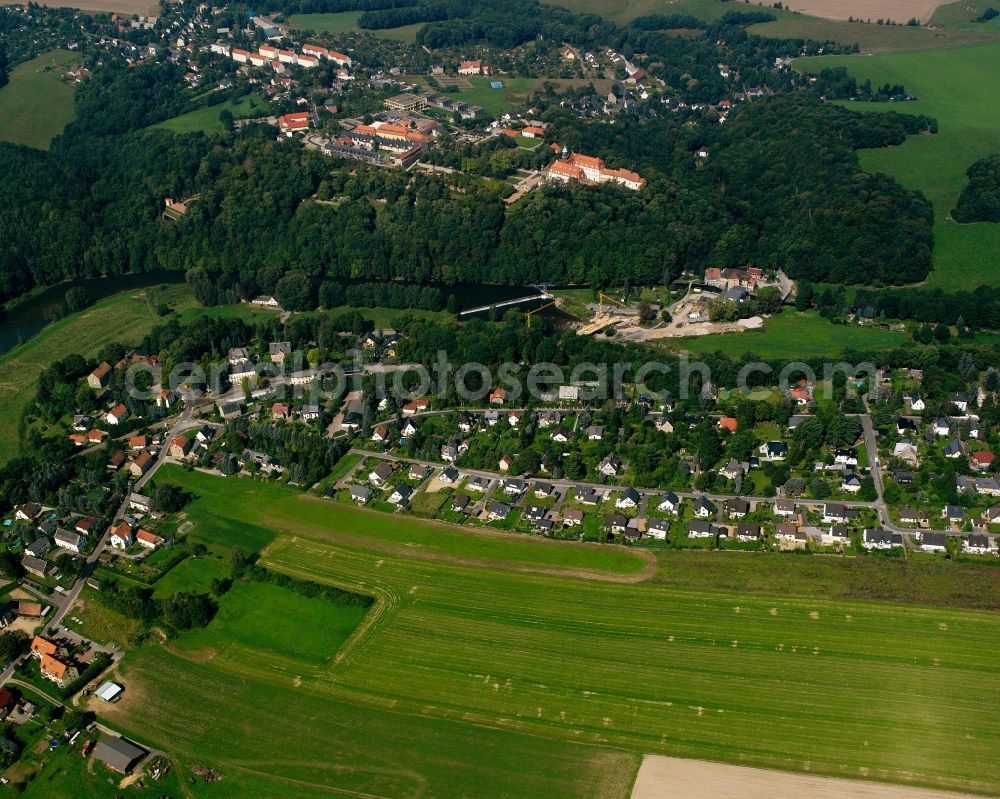 Aerial image Braunsdorf - Agricultural land and field boundaries surround the settlement area of the village in Braunsdorf in the state Saxony, Germany