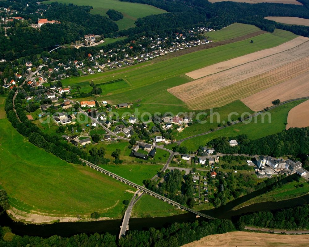 Aerial photograph Braunsdorf - Agricultural land and field boundaries surround the settlement area of the village in Braunsdorf in the state Saxony, Germany