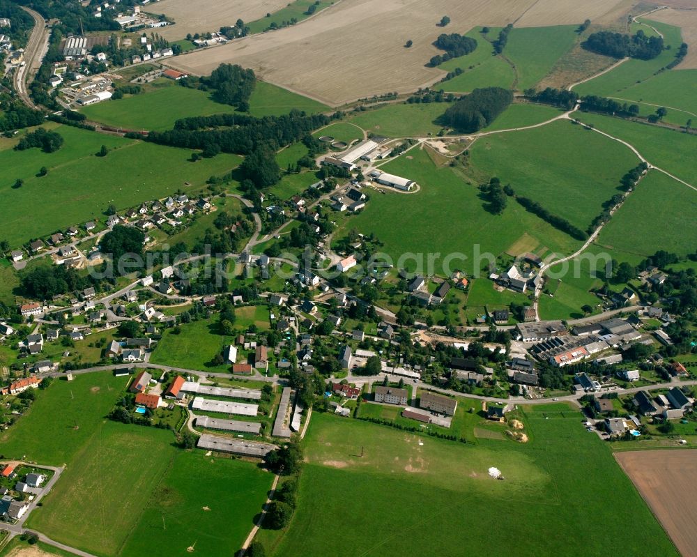 Breitenau from the bird's eye view: Agricultural land and field boundaries surround the settlement area of the village in Breitenau in the state Saxony, Germany