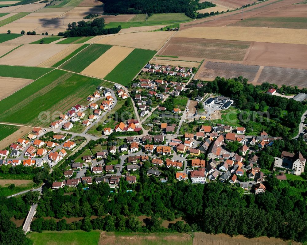 Aerial photograph Bürg - Agricultural land and field boundaries surround the settlement area of the village in Bürg in the state Baden-Wuerttemberg, Germany