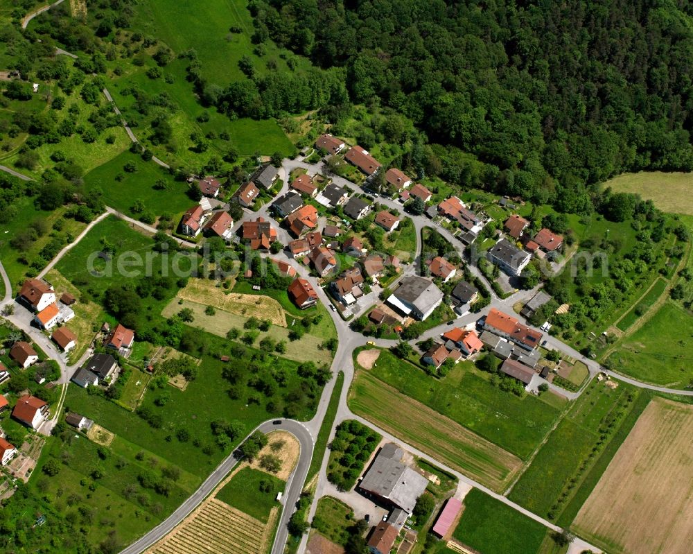 Bürg from above - Agricultural land and field boundaries surround the settlement area of the village in Bürg in the state Baden-Wuerttemberg, Germany