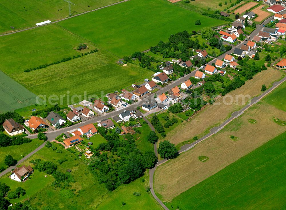 Börrstadt from the bird's eye view: Agricultural land and field boundaries surround the settlement area of the village in Börrstadt in the state Rhineland-Palatinate, Germany