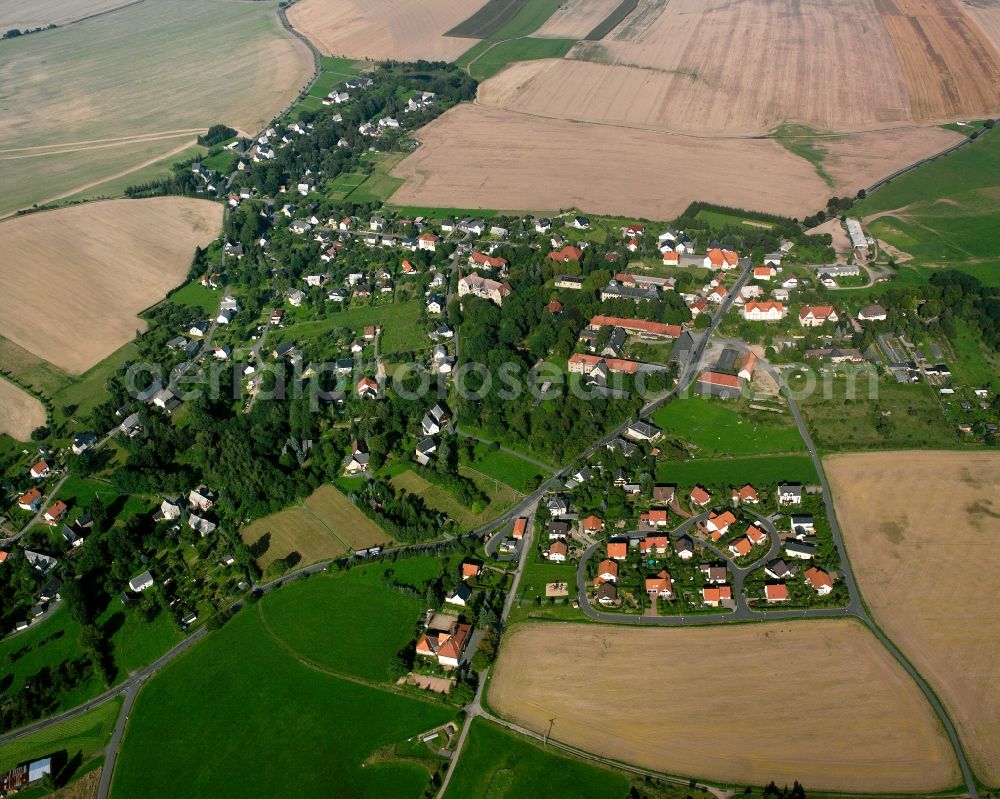 Aerial image Bräunsdorf - Agricultural land and field boundaries surround the settlement area of the village in Bräunsdorf in the state Saxony, Germany