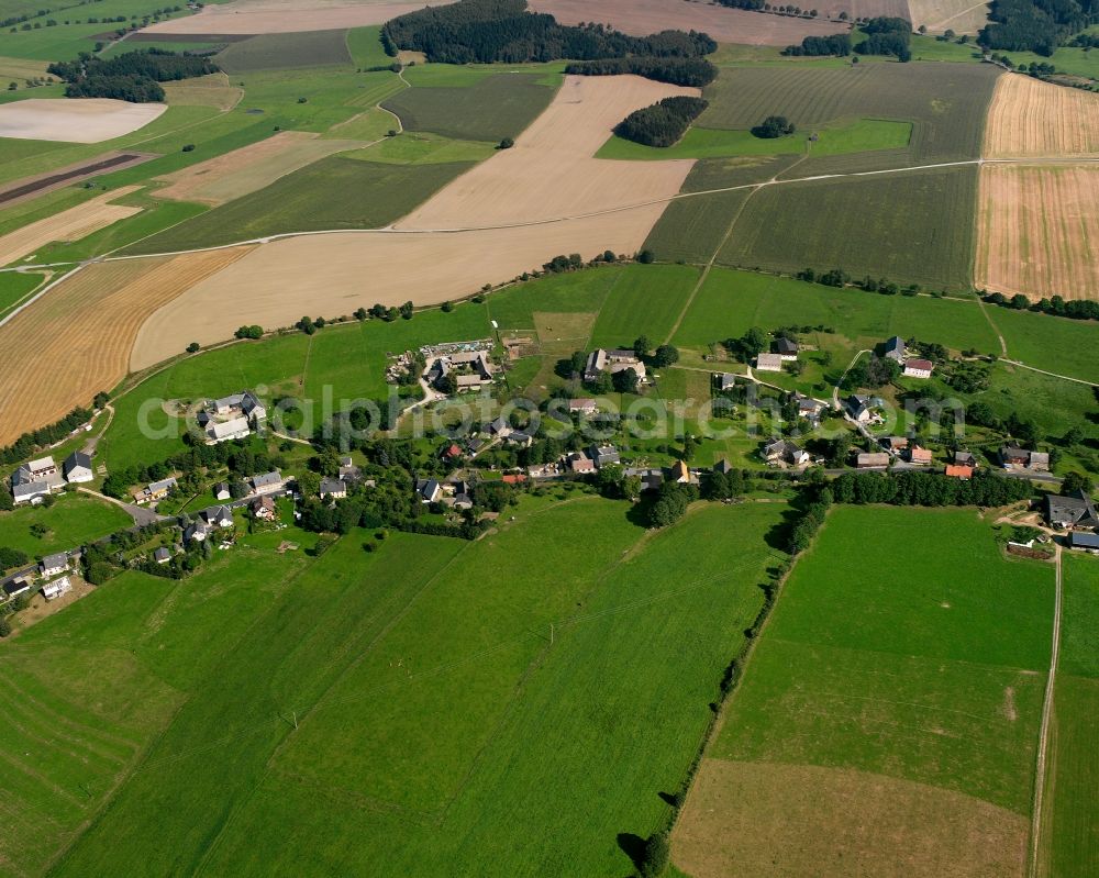Burkersdorf from the bird's eye view: Agricultural land and field boundaries surround the settlement area of the village in Burkersdorf in the state Saxony, Germany
