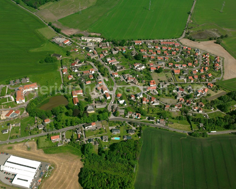 Aerial image Burkersdorf - Agricultural land and field boundaries surround the settlement area of the village in Burkersdorf in the state Thuringia, Germany