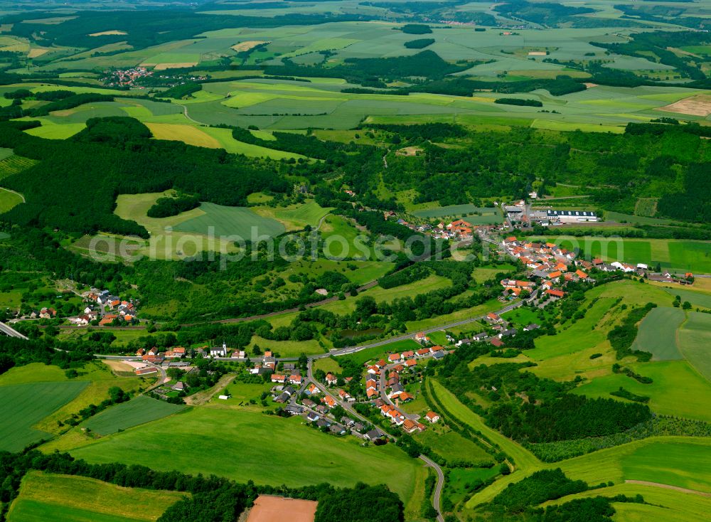 Cölln from above - Agricultural land and field boundaries surround the settlement area of the village in Cölln in the state Rhineland-Palatinate, Germany