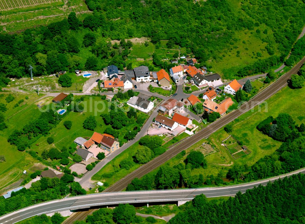 Aerial image Cölln - Agricultural land and field boundaries surround the settlement area of the village in Cölln in the state Rhineland-Palatinate, Germany