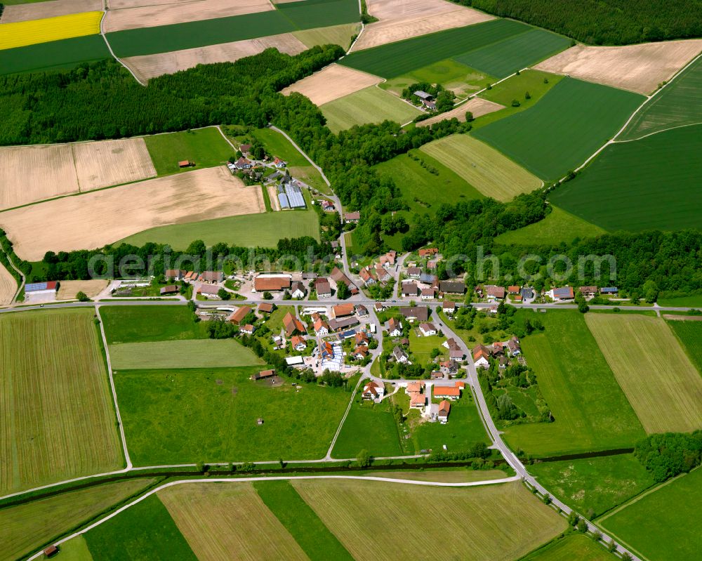 Degernau from above - Agricultural land and field boundaries surround the settlement area of the village in Degernau in the state Baden-Wuerttemberg, Germany