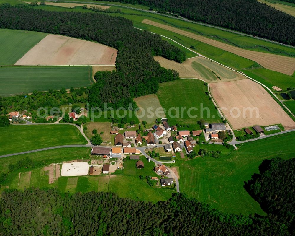 Dietenhofen from the bird's eye view: Agricultural land and field boundaries surround the settlement area of the village in Dietenhofen in the state Bavaria, Germany