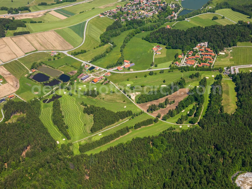 Dorn from above - Agricultural land and field boundaries surround the settlement area of the village in Dorn in the state Bavaria, Germany
