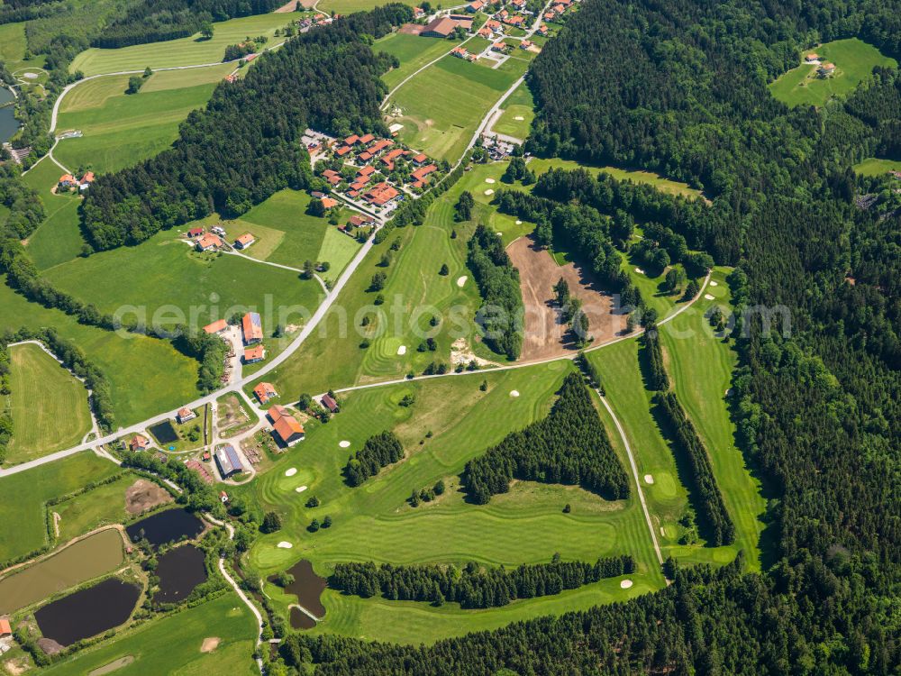Dorn from the bird's eye view: Agricultural land and field boundaries surround the settlement area of the village in Dorn in the state Bavaria, Germany
