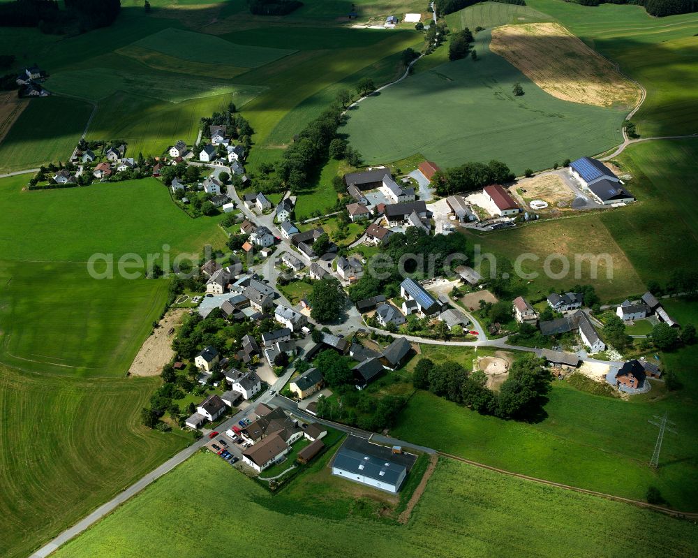 Dörnthal from the bird's eye view: Agricultural land and field boundaries surround the settlement area of the village in Dörnthal in the state Bavaria, Germany