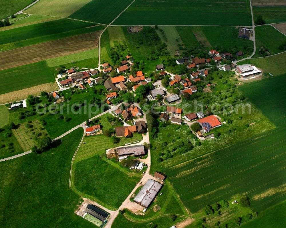 Eberhardsweiler from above - Agricultural land and field boundaries surround the settlement area of the village in Eberhardsweiler in the state Baden-Wuerttemberg, Germany