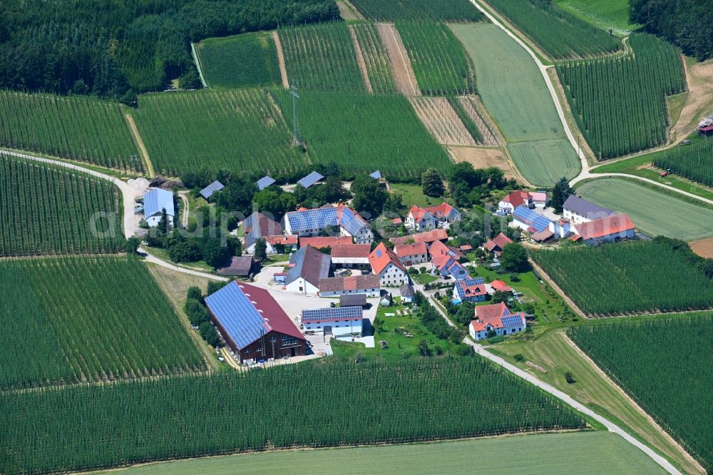 Eja from the bird's eye view: Agricultural land and field boundaries surround the settlement area of the village in Eja in the state Bavaria, Germany