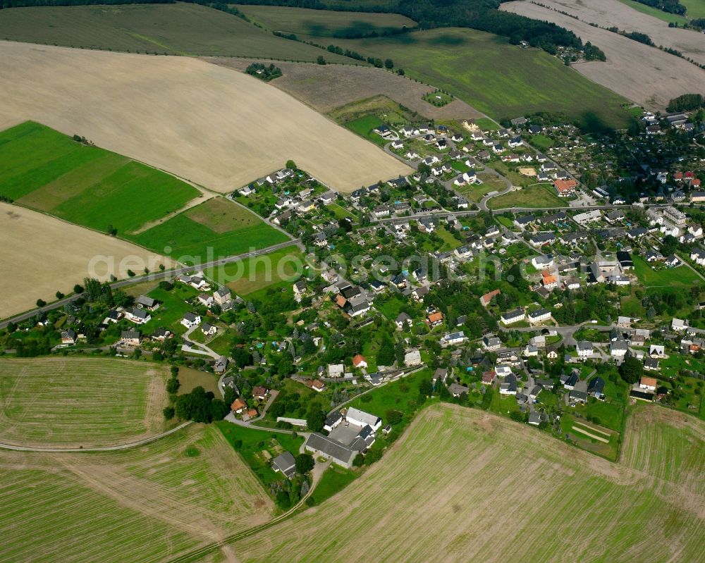 Aerial image Erdmannsdorf - Agricultural land and field boundaries surround the settlement area of the village in Erdmannsdorf in the state Saxony, Germany