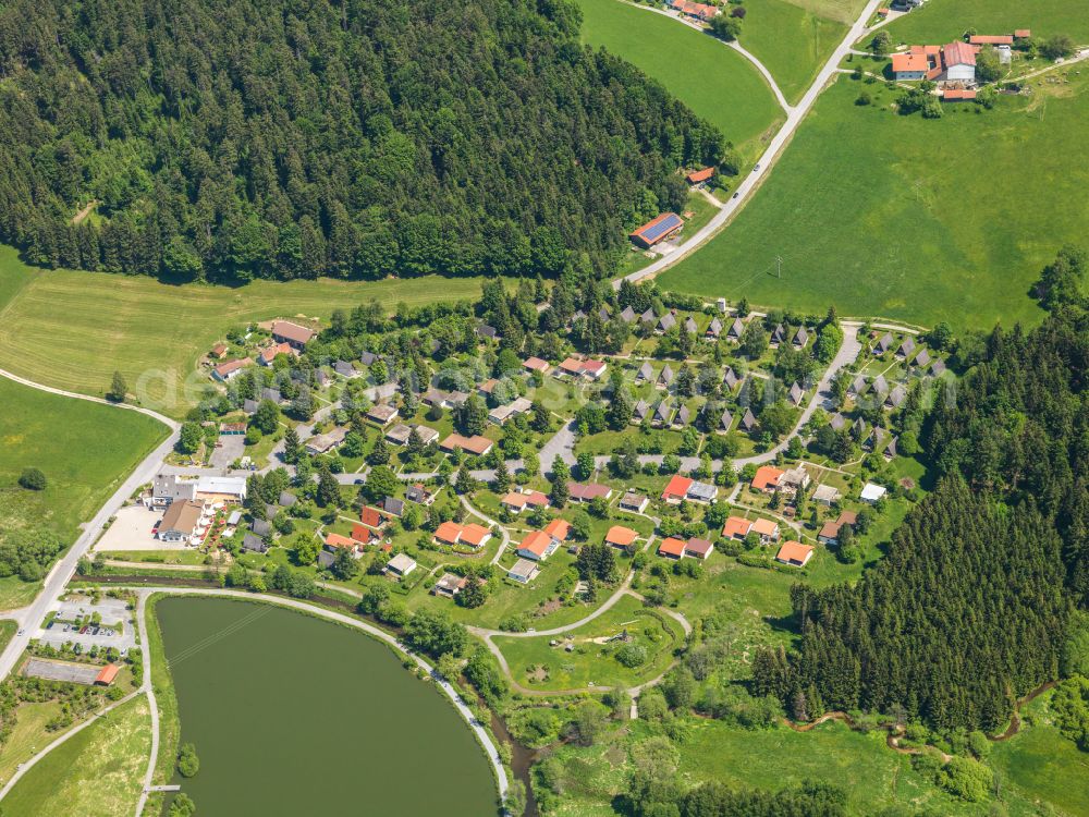 Erlauzwiesel from above - Agricultural land and field boundaries surround the settlement area of the village in Erlauzwiesel in the state Bavaria, Germany