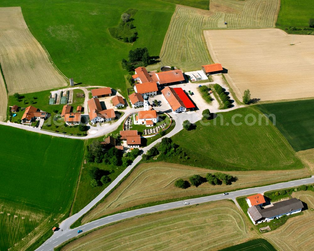 Erlbach from the bird's eye view: Agricultural land and field boundaries surround the settlement area of the village in Erlbach in the state Bavaria, Germany