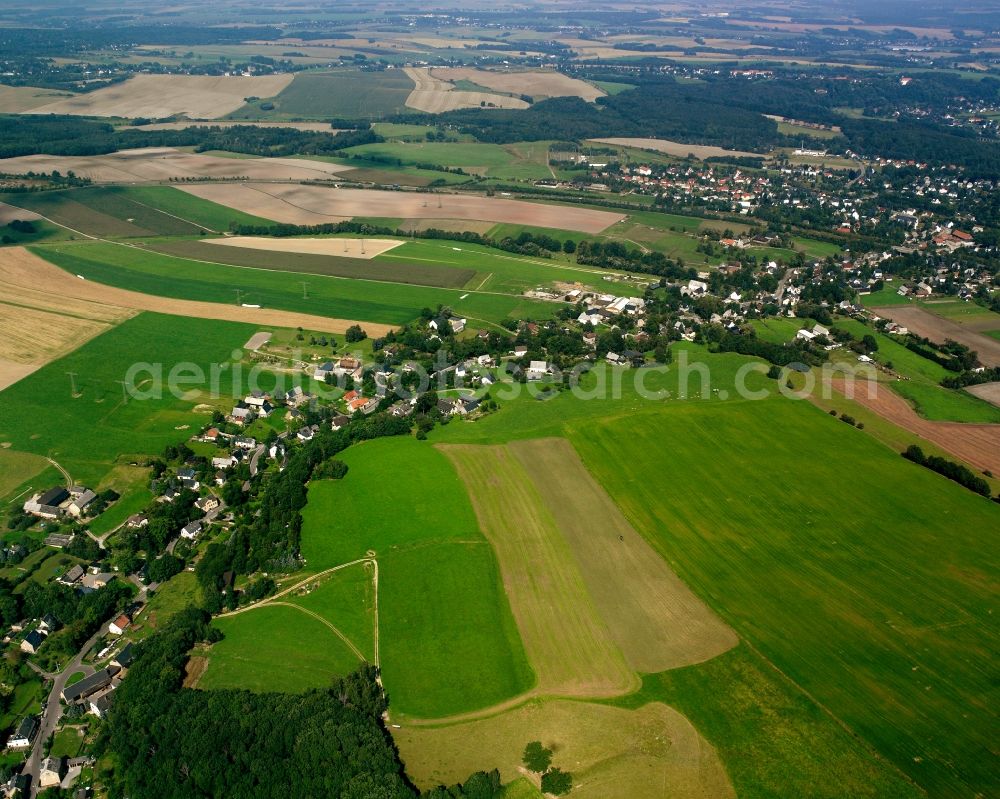 Aerial photograph Euba - Agricultural land and field boundaries surround the settlement area of the village in Euba in the state Saxony, Germany