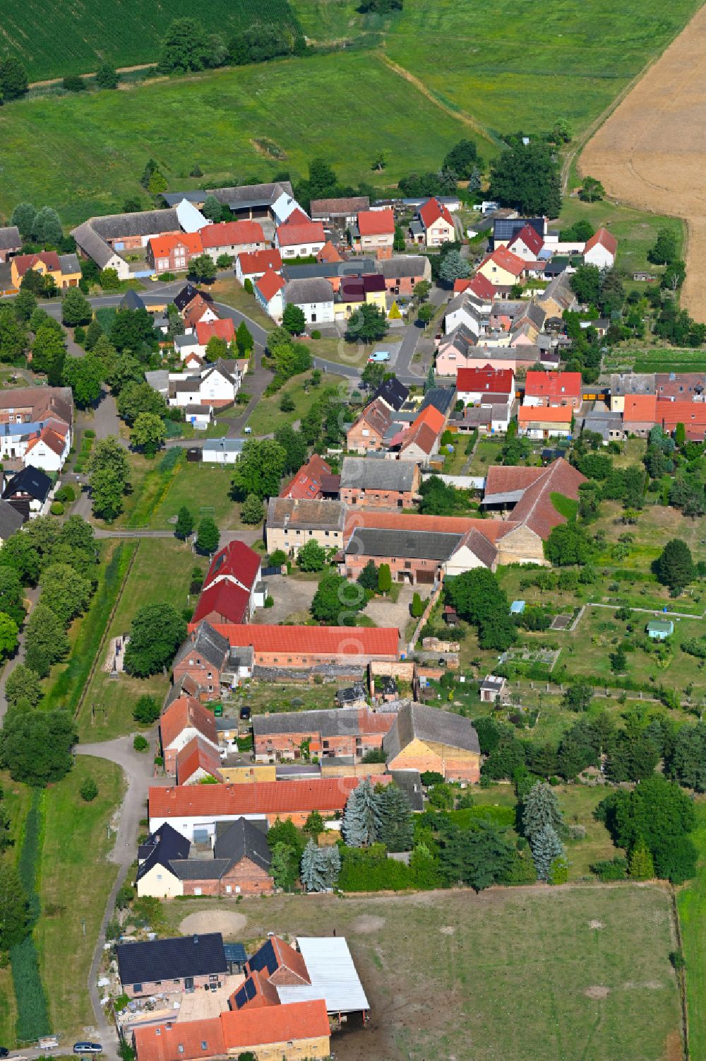 Aerial image Eutzsch - Agricultural land and field boundaries surround the settlement area of the village in Eutzsch in the state Saxony-Anhalt, Germany